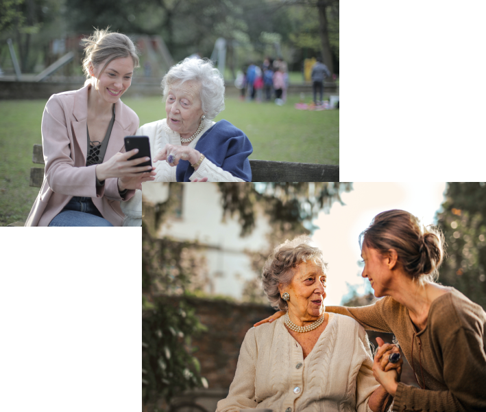 Elderly lady inquisitive about something being shown to her on a phone by a happy caregiver and Elderly hand being held by her caregiver while talking